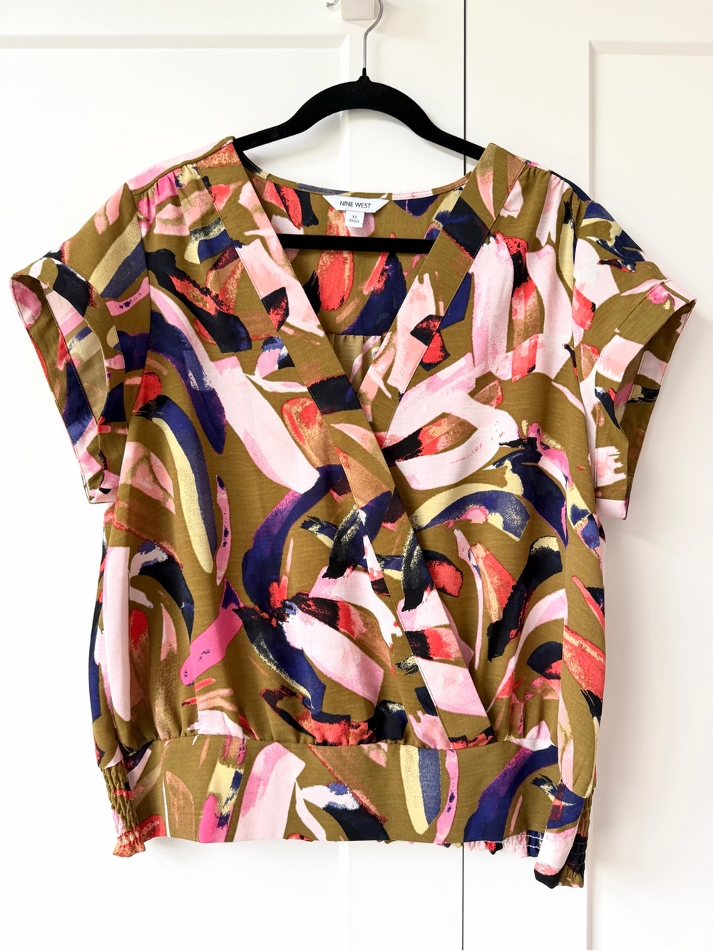 Abstract surplice wrap short sleeve blouse